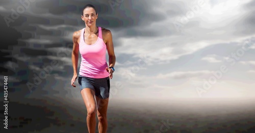 Composition of fit caucasian female athlete running with copy space on clouds background