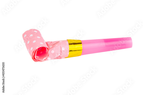 Pink horn noisemaker rolled for party isolated on the white background