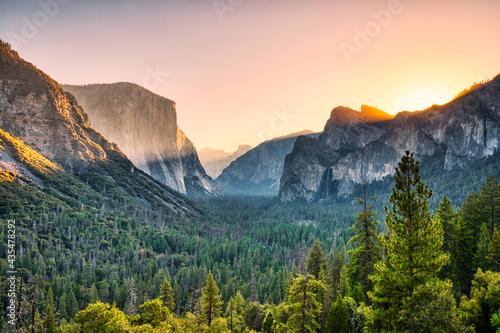 Illuminated Yosemite Valley view from the Tunnel Entrance to the Valley at Sunrise  Yosemite National Park