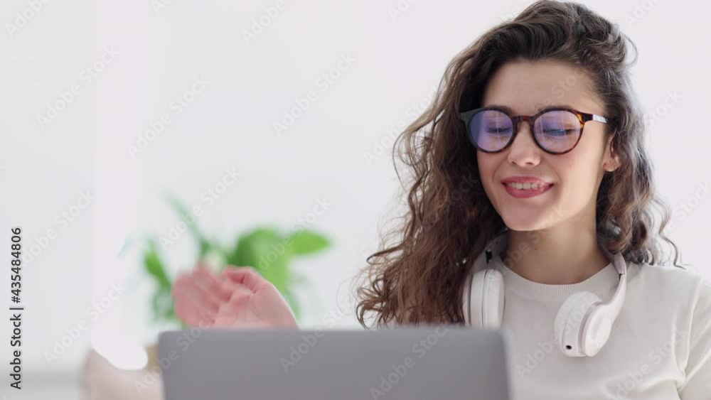 Attractive woman student talk on video call meeting in light room Spbi. Teen female at home discuss Attractive woman student talk on video call meeting in light room Spbi. Teen female at home discuss