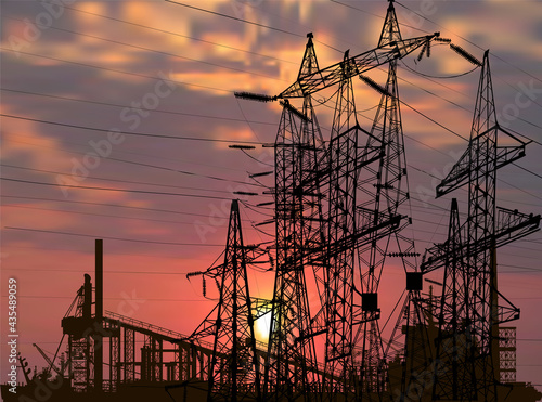 high electric towers group at sunset