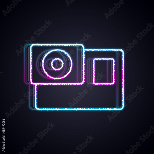 Glowing neon line Action extreme camera icon isolated on black background. Video camera equipment for filming extreme sports. Vector