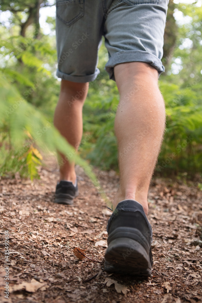 close up of legs of a male hiker