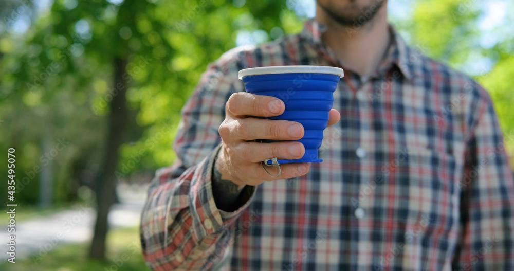 zero waste concept, young male use reusable coffee cup zero waste concept, young male use reusable coffee cup