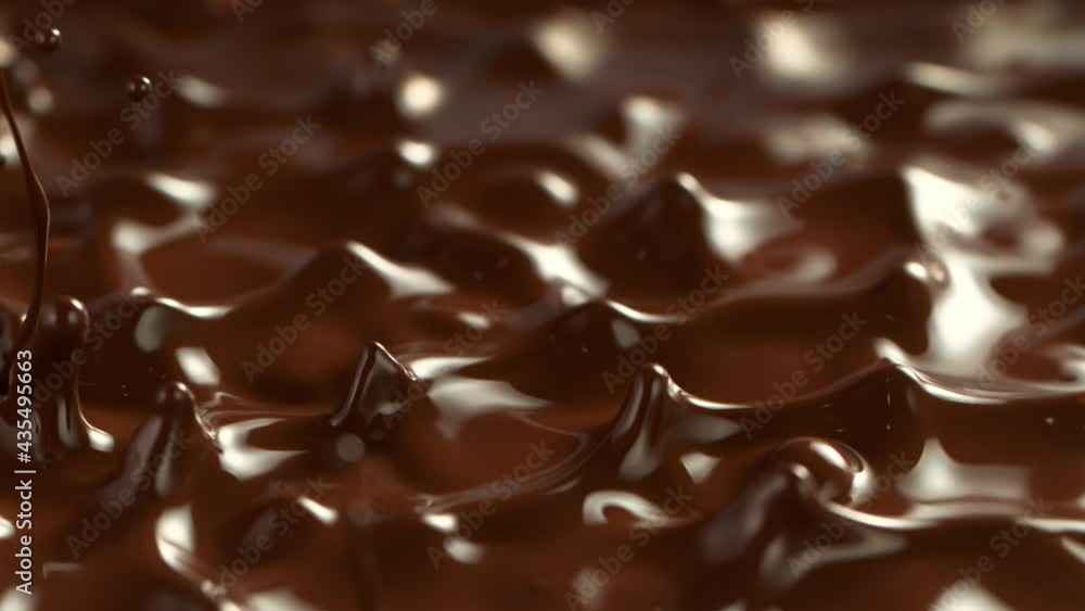 Super Slow Motion Shot of Pulsing Melted Chocolate at 1000 fps. Super Slow Motion Shot of Pulsing Melted Chocolate at 1000 fps.