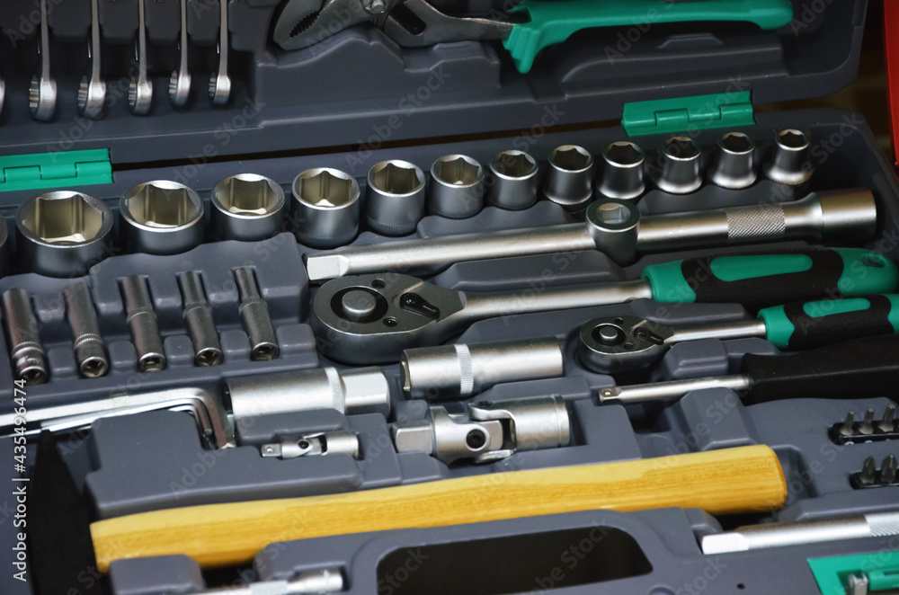 Professional chrome tools organized in toolbox.Mechanic tool showcase in retail shop. Professional chrome tools organized in toolbox.Mechanic tool showcase in retail shop.
