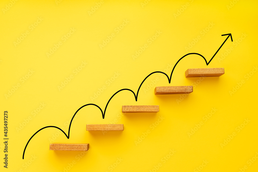 Rising arrow on staircase on yellow background. Growth, increasing business, success process concept - obrazy, fototapety, plakaty 