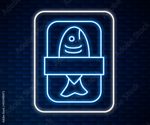 Glowing neon line Fish plastic tray container with cellophane cover icon isolated on brick wall background. Vector