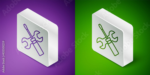 Isometric line Screwdriver and wrench spanner tools icon isolated on purple and green background. Service tool symbol. Silver square button. Vector