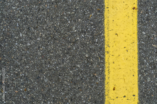 yellow markings on the asphalt  © yatsyna.s