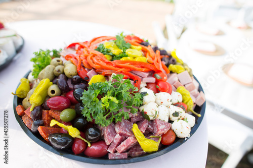 close up of a plate with assorted appetizers served on a wedding celebration