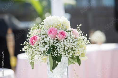 close up of a flower bouquet in a wedding ceremony