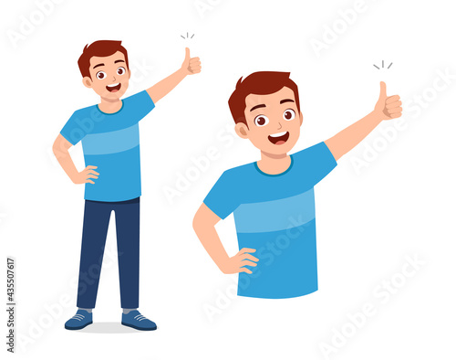 young good looking man doing thumb up pose