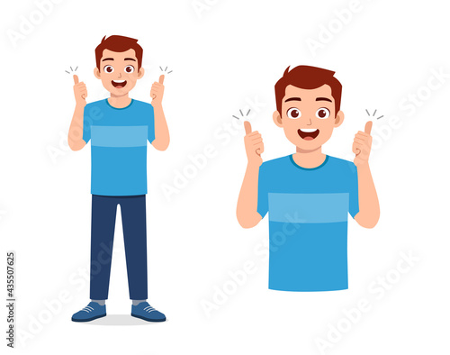 young good looking man doing thumb up pose