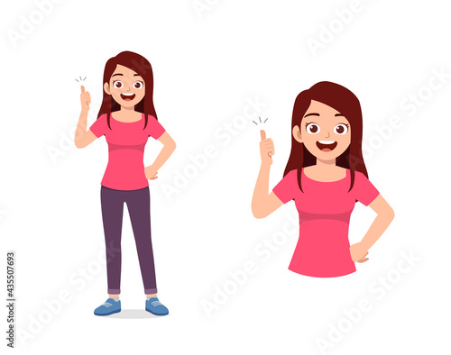 young good looking woman doing thumb up pose