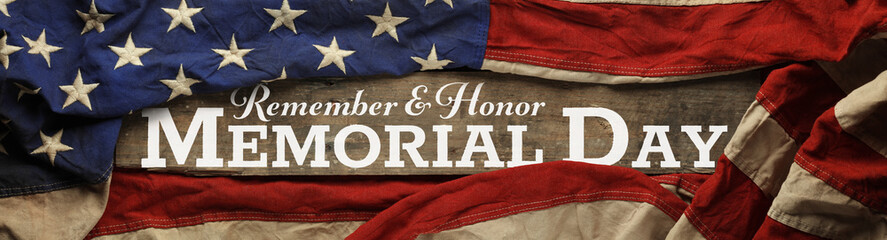 US American flag covering distressed and worn wood. Wallpaper for USA Memorial Day with Remember and Honor Memorial Day.
