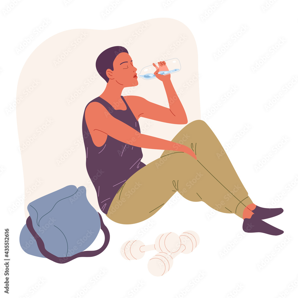 Young man sits on the floor and drinks water Young man sits on the floor and drinks water