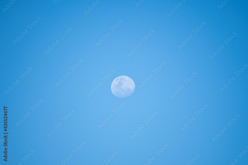 3 quarter moon in the daylight sky 3 quarter moon in the daylight sky