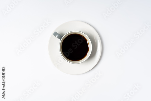 A cup of coffee on a white background