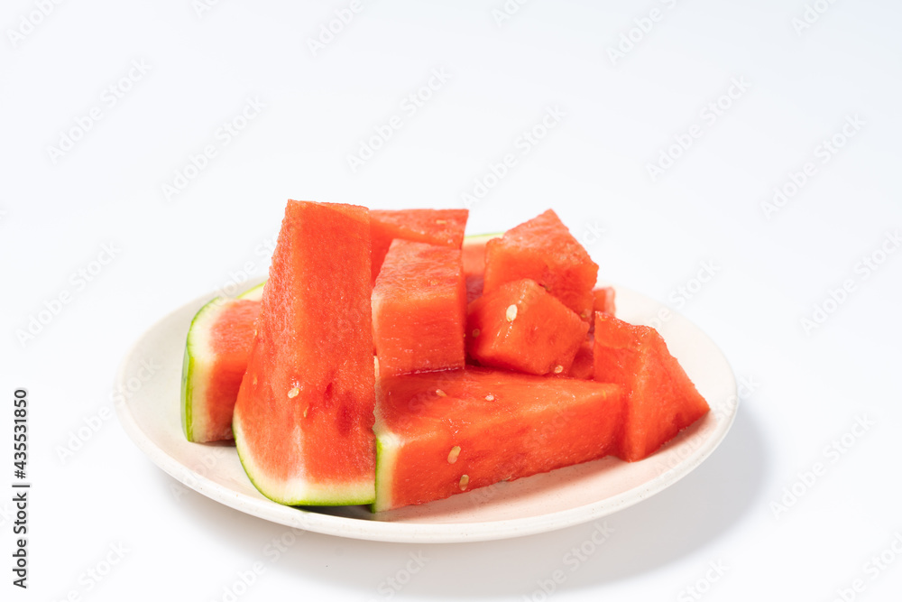 The sliced watermelon is on the plate The sliced watermelon is on the plate