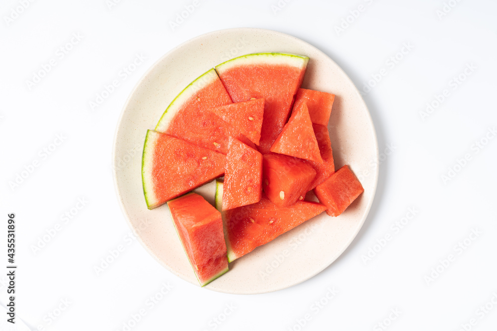 The sliced watermelon is on the plate The sliced watermelon is on the plate