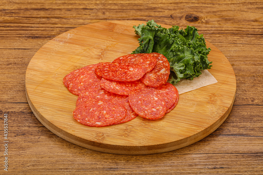 Italian spycy pepperoni sausage slices Italian spycy pepperoni sausage slices