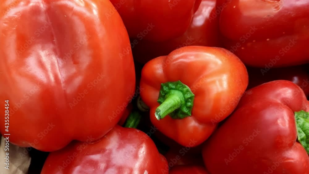Stack of red pepper in grocery store. Industry of selling products