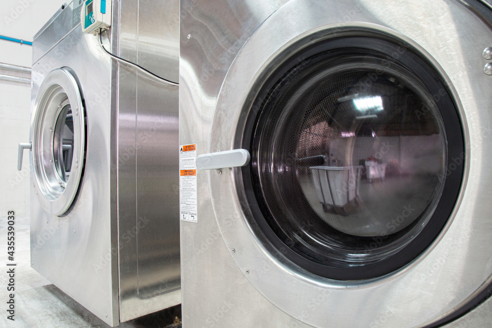 2 industrial washing machines. Shot taken in the factory. 2 industrial washing machines. Shot taken in the factory.