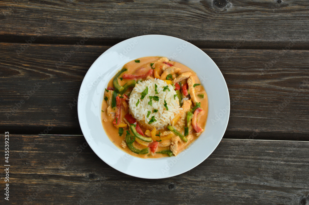 rice with chicken and paprika in sour cream sauce rice with chicken and paprika in sour cream sauce