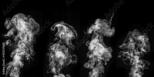 A perfect set of four different mystical curly white steam or smoke on a black background. Abstract background fog or smog, design element for Halloween, layout for collages.