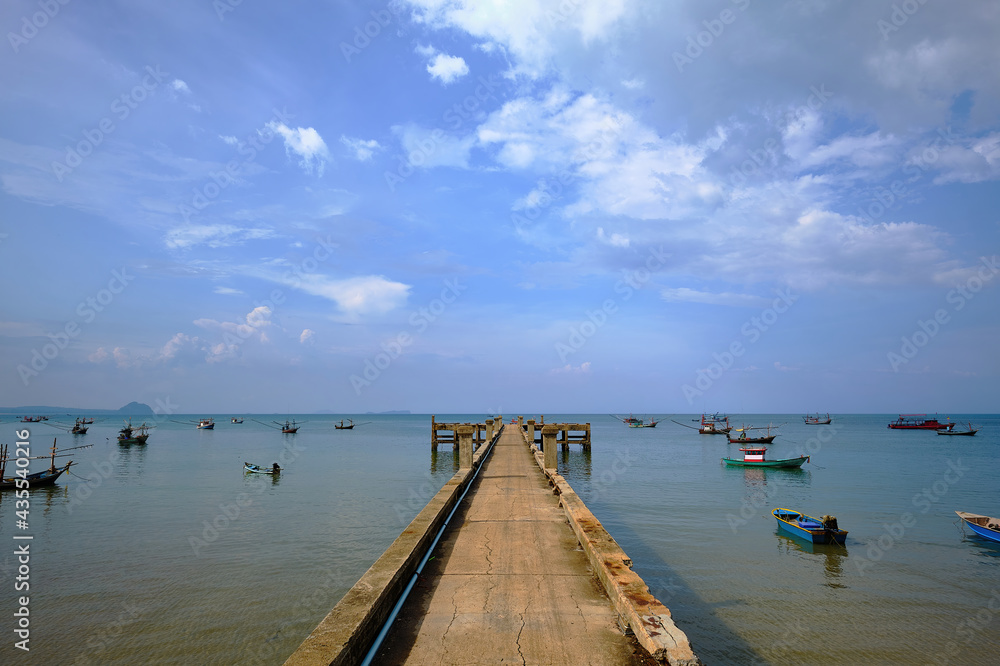 Pier with many fishing boats 