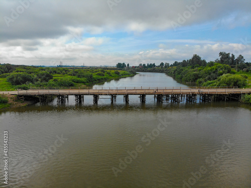 Aerial view of the temporary bridge over the Pizhma river (Sovetsk, Kirov region, Russia)
