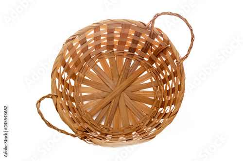 straw empty basket isolated on white background