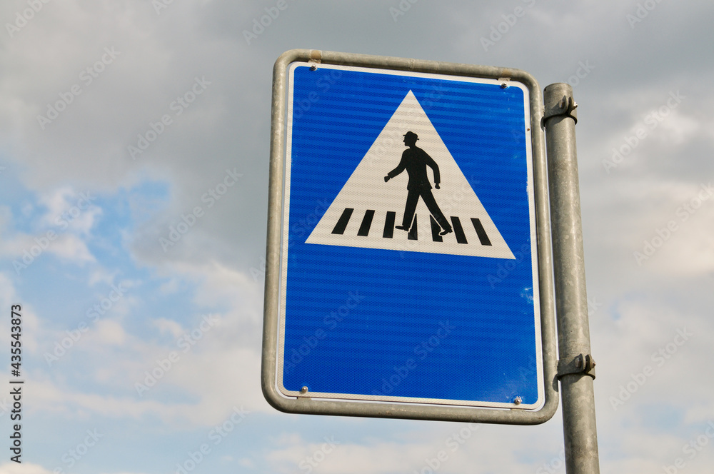 Pedestrian crossing street sign in Switzerland