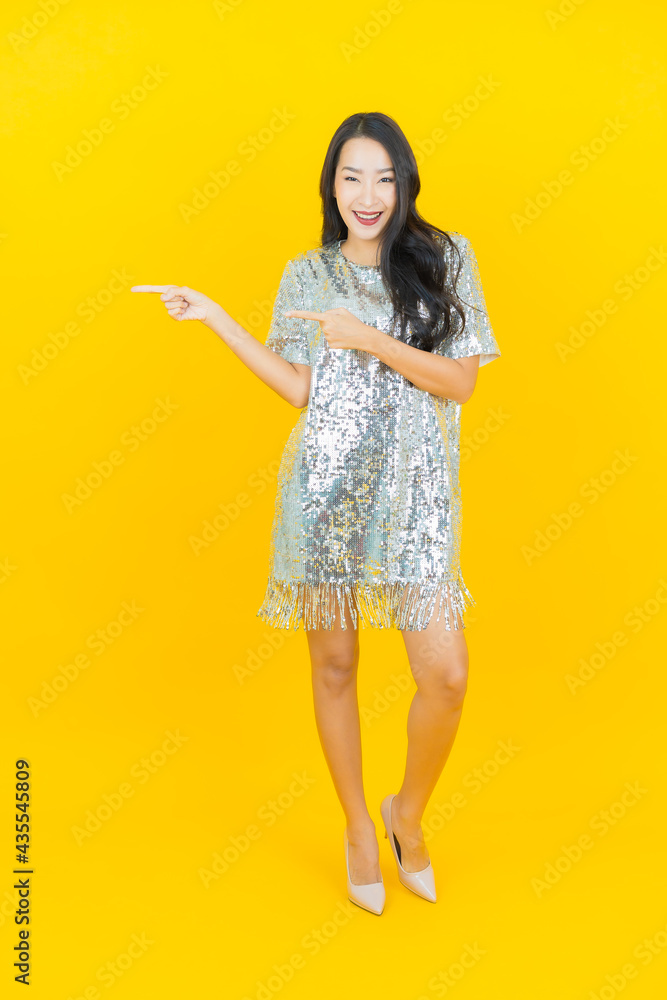 Portrait beautiful young asian woman smile with action Portrait beautiful young asian woman smile with action