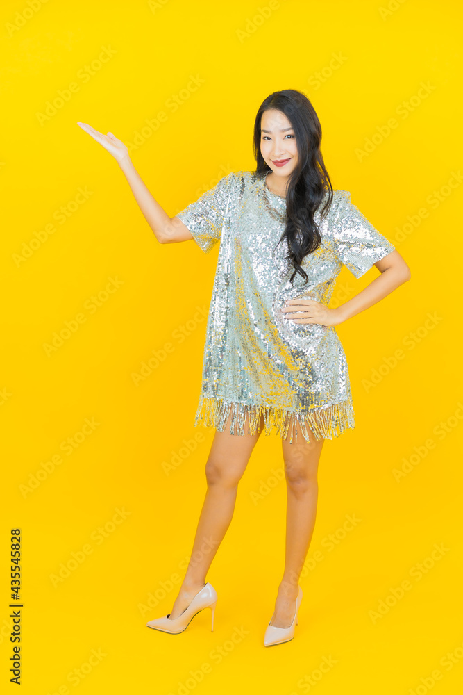 Portrait beautiful young asian woman smile with action Portrait beautiful young asian woman smile with action
