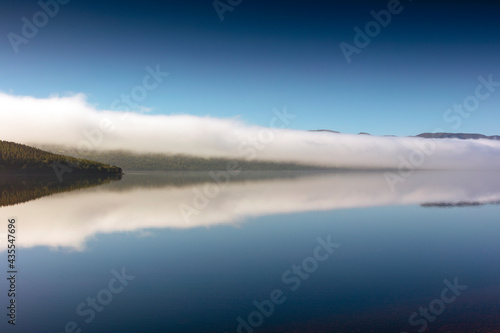Morning fog over the Loch Ness in Scotland