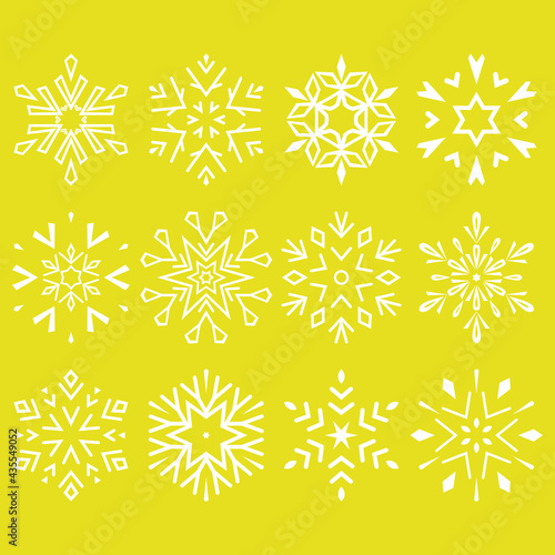 Snowflakes icon collection. Graphic modern yellow and white ornament
