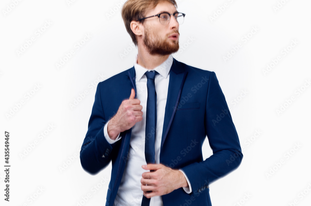 business man straightens his jacket and tie around his neck shirt classic glasses business man straightens his jacket and tie around his neck shirt classic glasses
