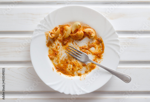 Wall Mural leftover of pasta food in white plate