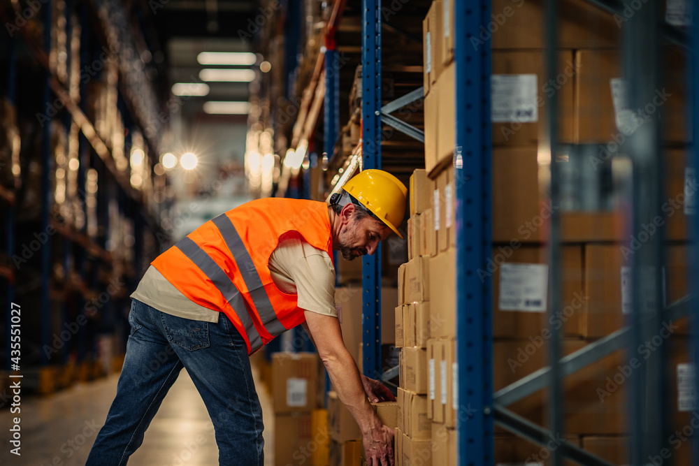 Male worker working in warehouse Male worker working in warehouse