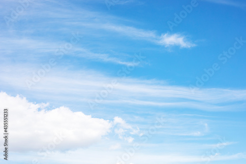 blue clear sky with cirrus storm clouds  horizontal.