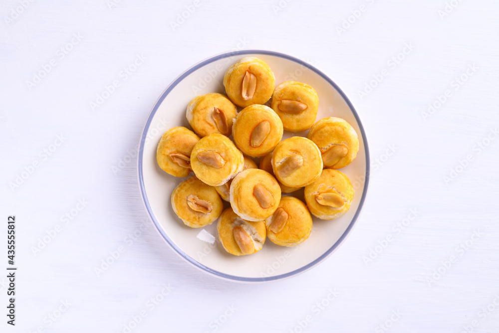 Peanut cookies or Asian cookies singapore on plate with white background, Top view Peanut cookies or Asian cookies singapore on plate with white background, Top view