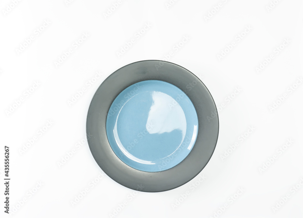 Indonesian-made ceramic plates are Tosca green and old Tosca on a white background Indonesian-made ceramic plates are Tosca green and old Tosca on a white background