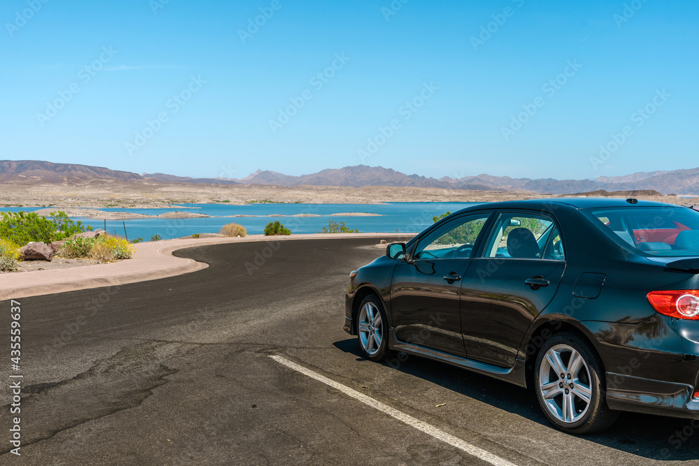 The car is parked with a view of the Las Vegas Bay, Nevada