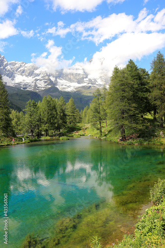 Summer alpine landscape with the Matterhorn (Cervino) reflected on the Blue Lake (Lago Blu) near Breuil-Cervinia, Aosta Valley, northern Italy