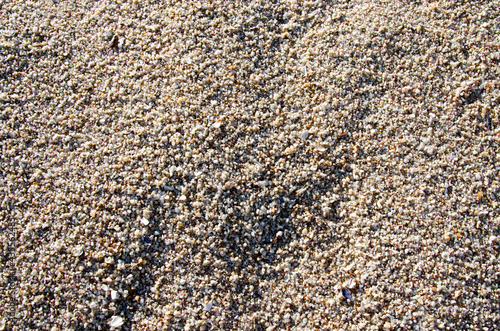 Image of the surface of the sand after rain has porous rain marks