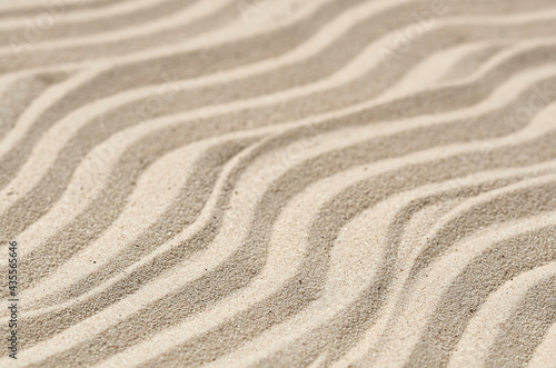 wavy sand texture in narrow focus and blurring © VeKoAn