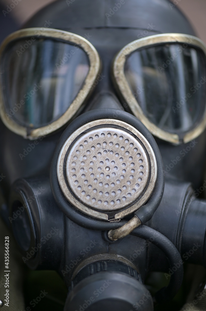 A black world war II gas mask on a flea market in Spain. A black world war II gas mask on a flea market in Spain.