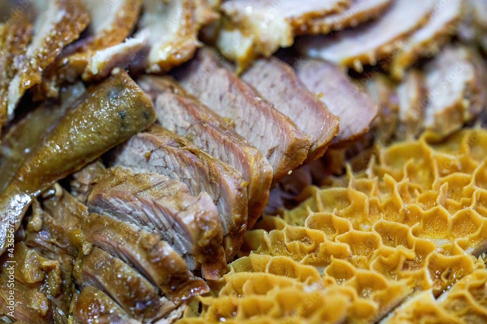 A delicious Chinese dish, a platter of braised vegetables, tripe and beef tongue A delicious Chinese dish, a platter of braised vegetables, tripe and beef tongue